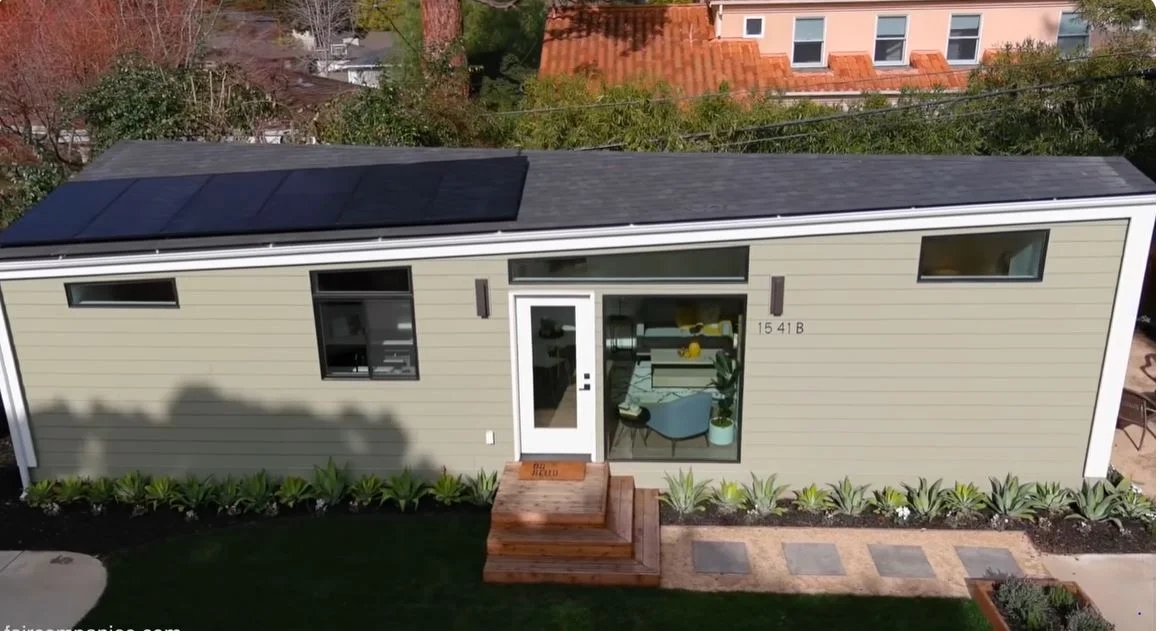 Modern tiny house with solar panels