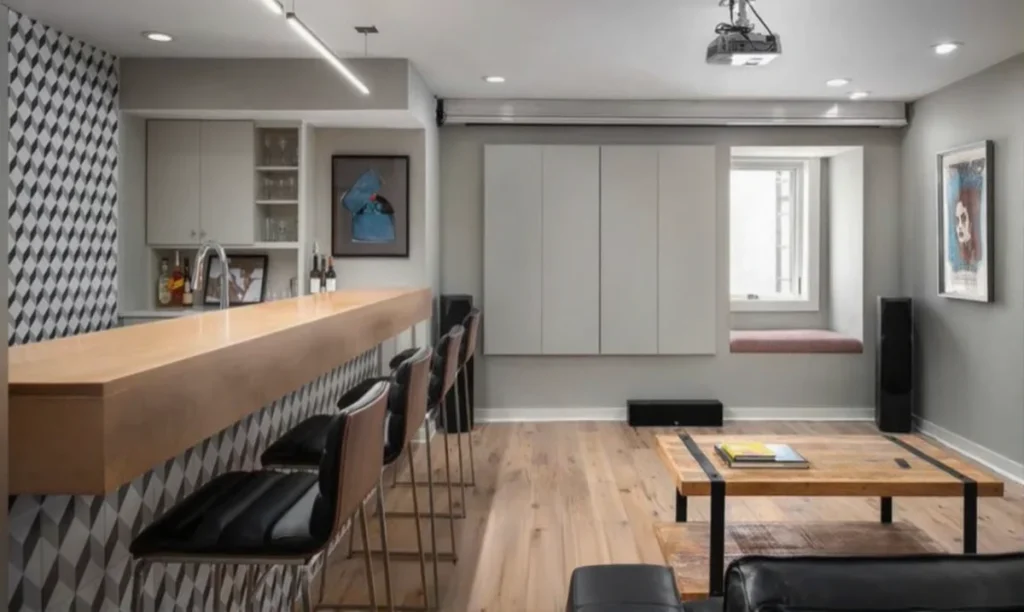 Basement with small kitchen and table